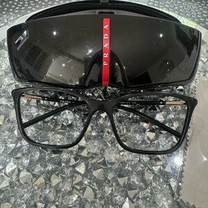 Prada eyeglasses frames black with gold logo detail on arms
Prada PR 08WV